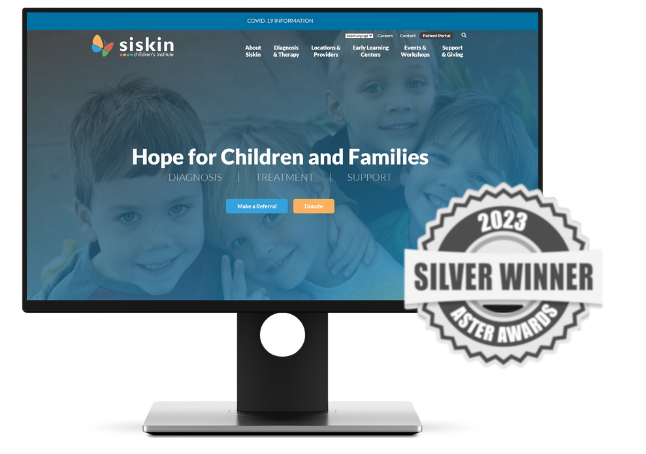aster award overlaid siskin children's institute website on a monitor