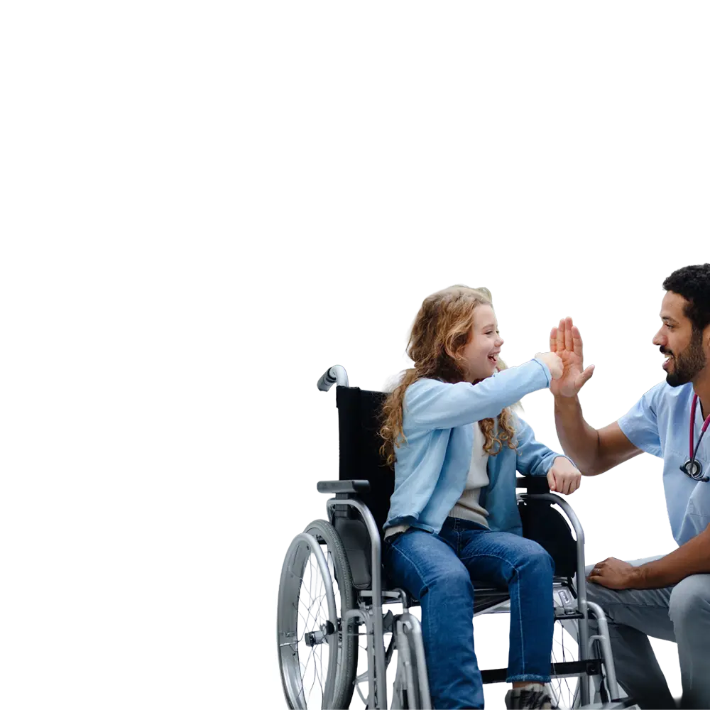 Laughing girl in wheelchair with doctor high five